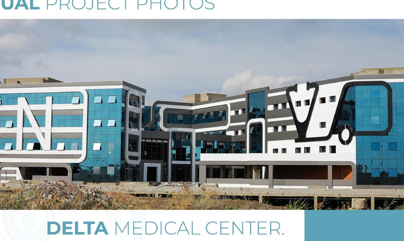 Construction photo: completed structure and facade, Delta Center.
